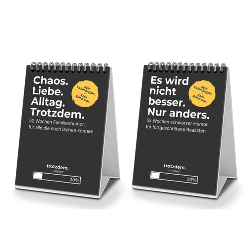 Kalender-Bundle: Familienkalender und Schwarzer Humor Edition nebeneinander